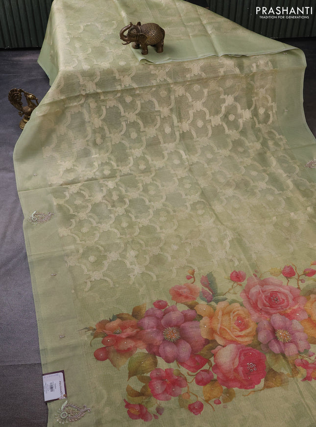 Kota tissue saree pista green with floral prints & pita work and zardosi work butta border