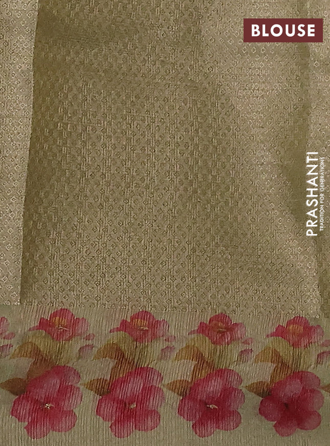 Kota tissue saree pista green with floral prints & pita work and zardosi work butta border