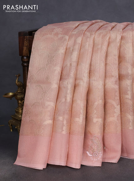 Kota tissue saree pastel peach with floral prints & pita work and zardosi work butta border