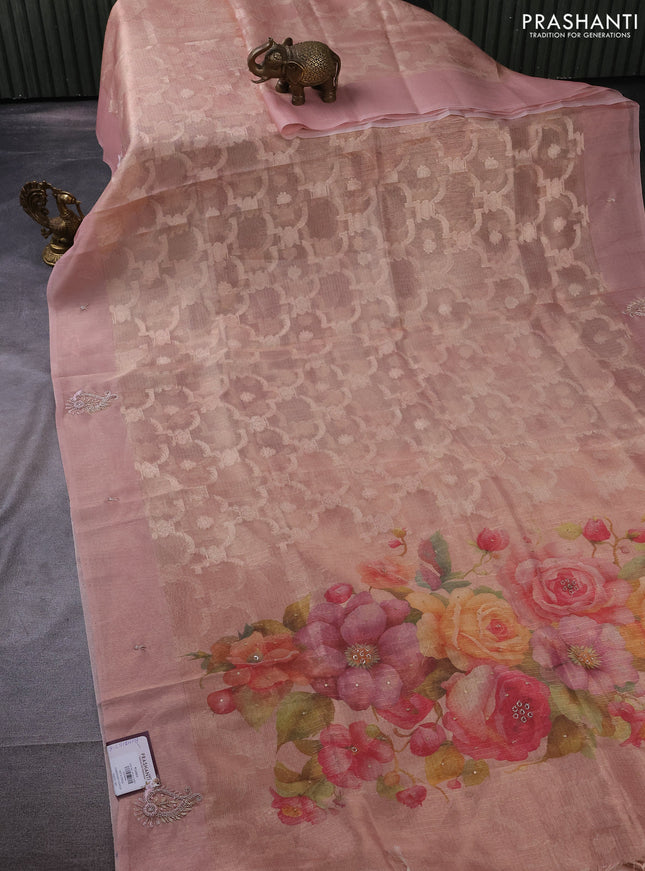 Kota tissue saree pastel peach with floral prints & pita work and zardosi work butta border