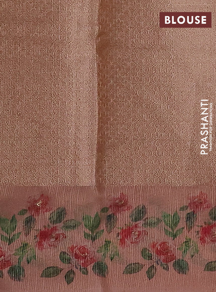 Kota tissue saree pastel peach with floral prints & pita work and zardosi work butta border