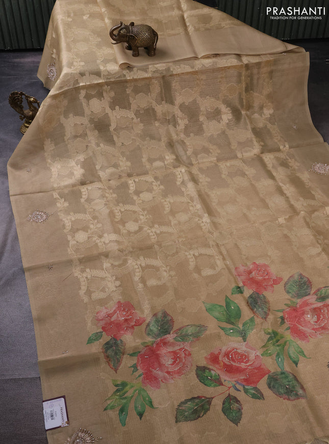 Kota tissue saree sandal with floral prints & pita work and zardosi work butta border