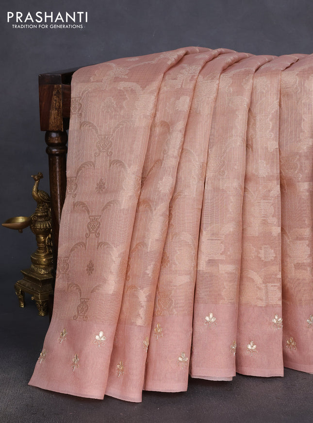 Kota tissue saree pastel peach with floral prints & pita work and zardosi work butta border