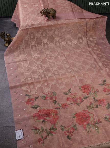 Kota tissue saree pastel peach with floral prints & pita work and zardosi work butta border