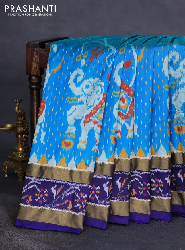 Pochampally silk saree dual shade of cs blue and blue with allover ikat weaves and temple design ikat woven border