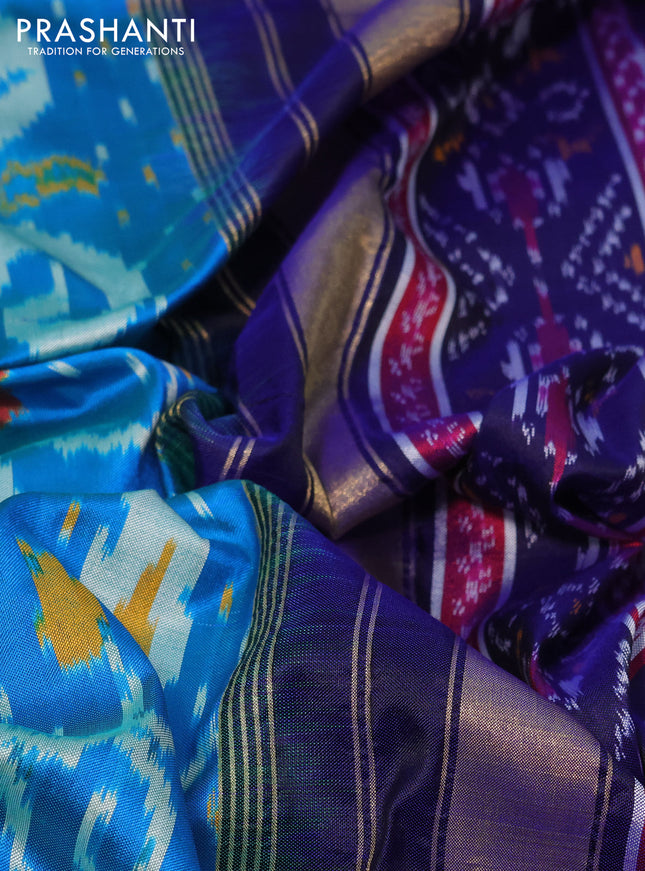 Pochampally silk saree dual shade of cs blue and blue with allover ikat weaves and temple design ikat woven border