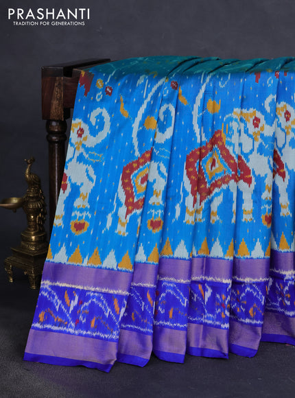 Pochampally silk saree dual shade of cs blue and royal blue with allover ikat weaves and temple design ikat woven border