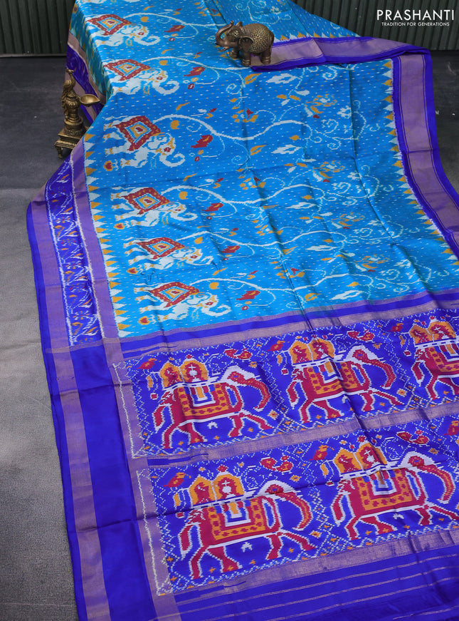 Pochampally silk saree dual shade of cs blue and royal blue with allover ikat weaves and temple design ikat woven border
