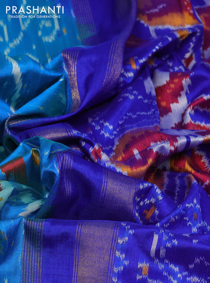 Pochampally silk saree dual shade of cs blue and royal blue with allover ikat weaves and temple design ikat woven border