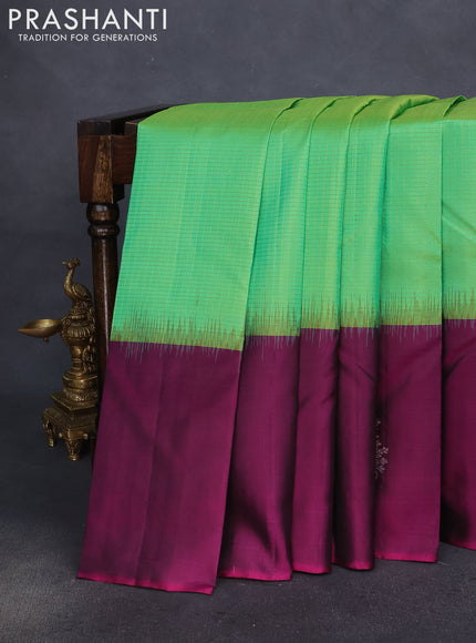 Pure soft silk saree dual shade of green and purple with allover small zari checked pattern and long silver zari woven butta border