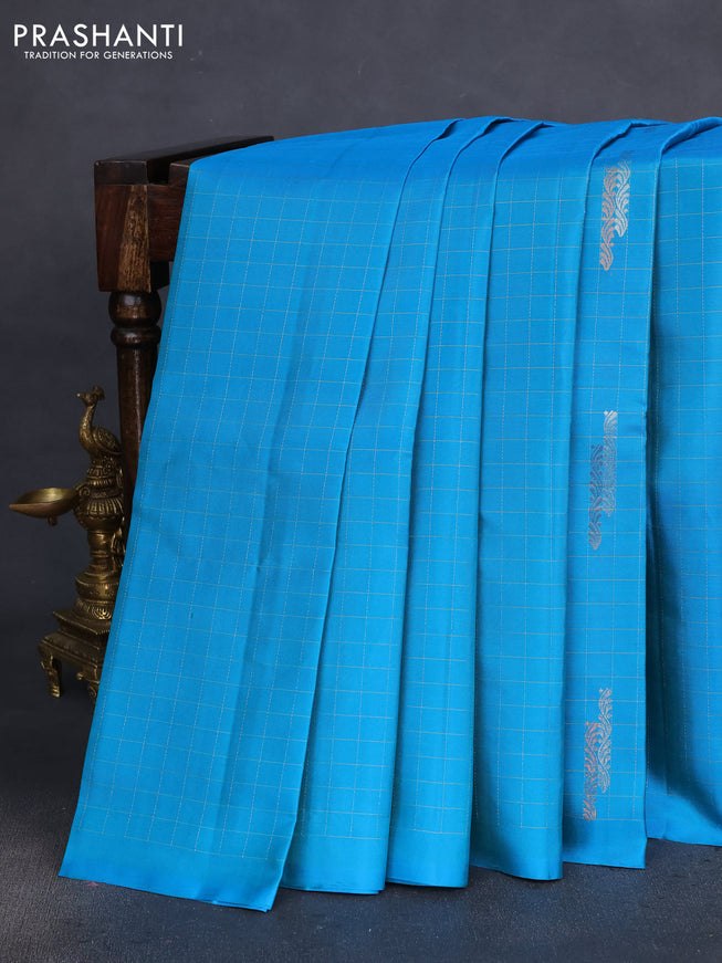 Pure soft silk saree dual shade of blue and pink with allover zari checks & buttas in borderless style