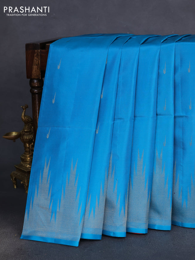 Pure soft silk saree cs blue and dual shade of pinkish orange with zari woven muniya buttas and temple design zari woven border