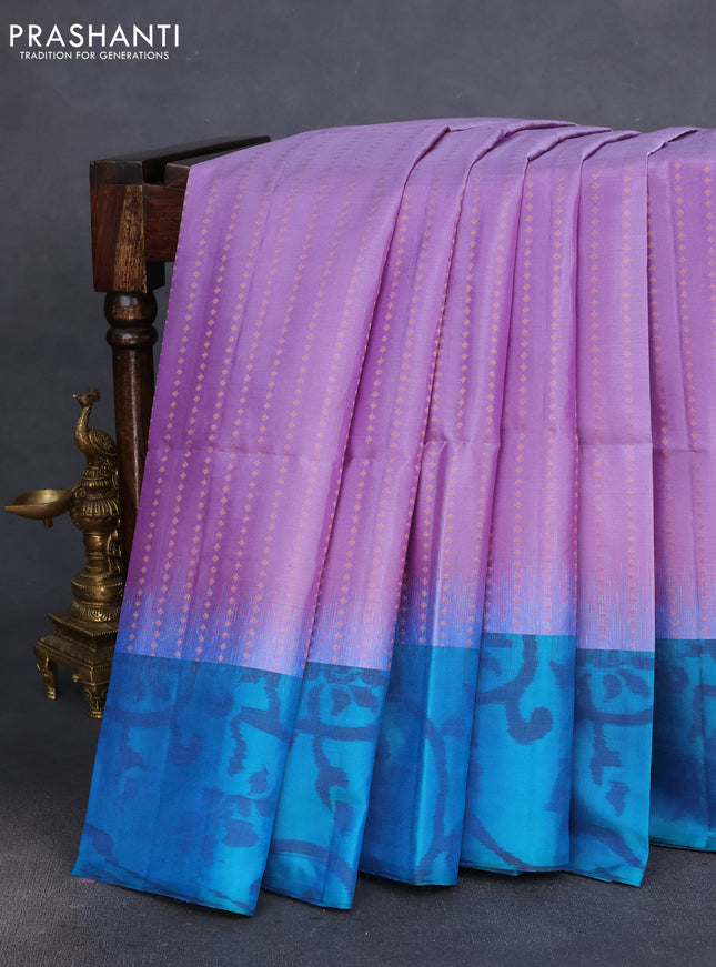 Pure soft silk saree lavender and dual shade of blue with copper zari woven buttas and ikat style border