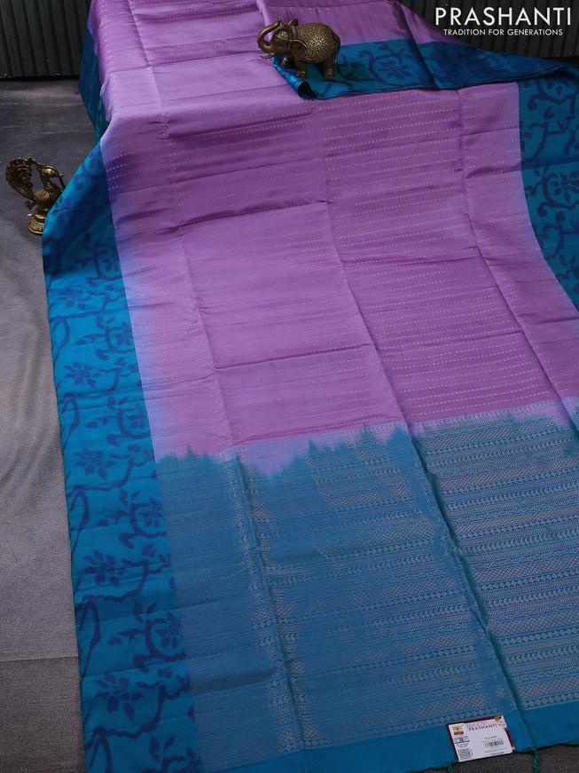 Pure soft silk saree lavender and dual shade of blue with copper zari woven buttas and ikat style border