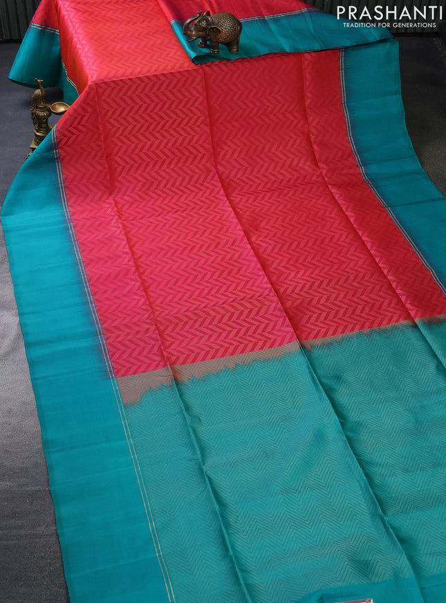 Pure soft silk saree dual shade of pinkish orange and teal green shade with allover zari weaves and zari woven simple border