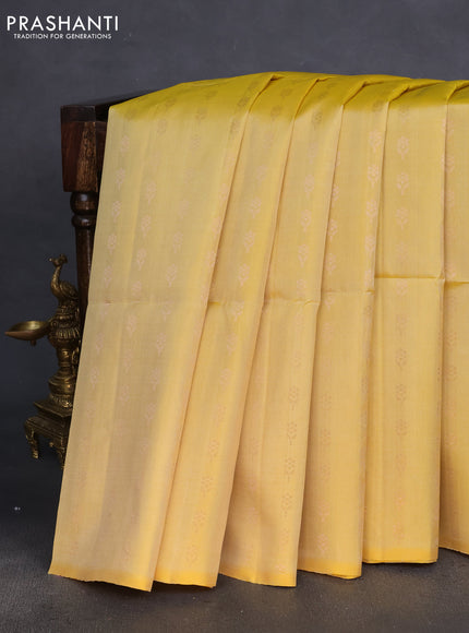 Pure soft silk saree yellow with allover floral zari woven buttas in borderless style