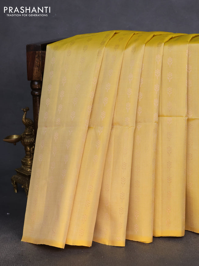 Pure soft silk saree yellow with allover floral zari woven buttas in borderless style