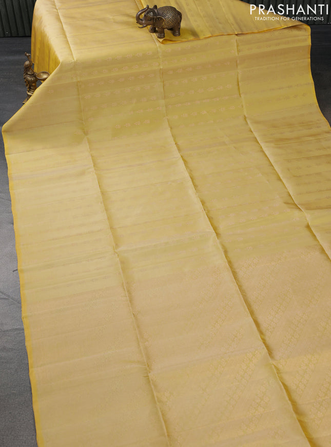 Pure soft silk saree yellow with allover floral zari woven buttas in borderless style