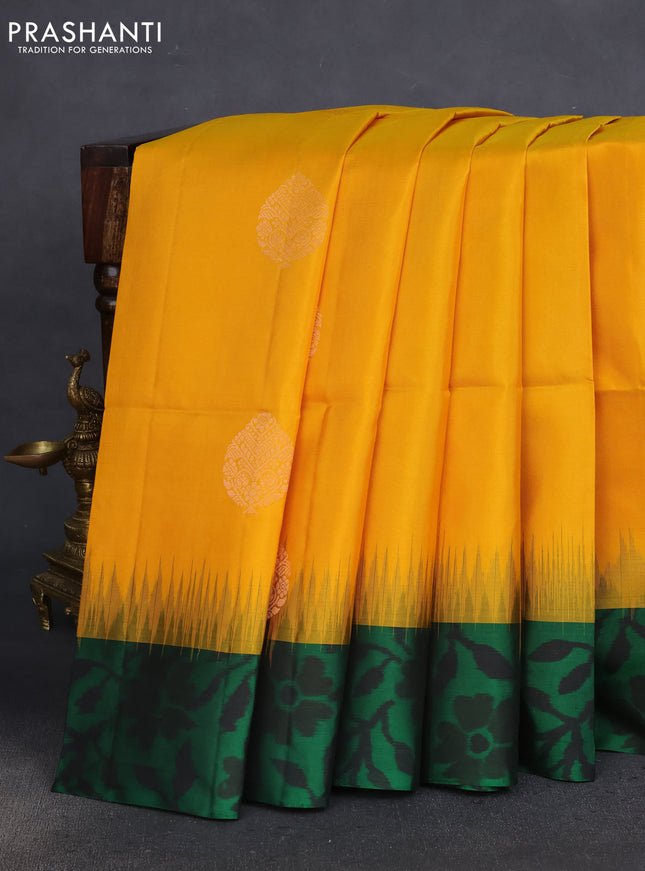 Pure soft silk saree yellow and green with copper zari woven buttas and ikat style border