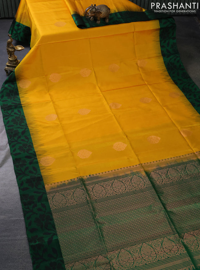 Pure soft silk saree yellow and green with copper zari woven buttas and ikat style border