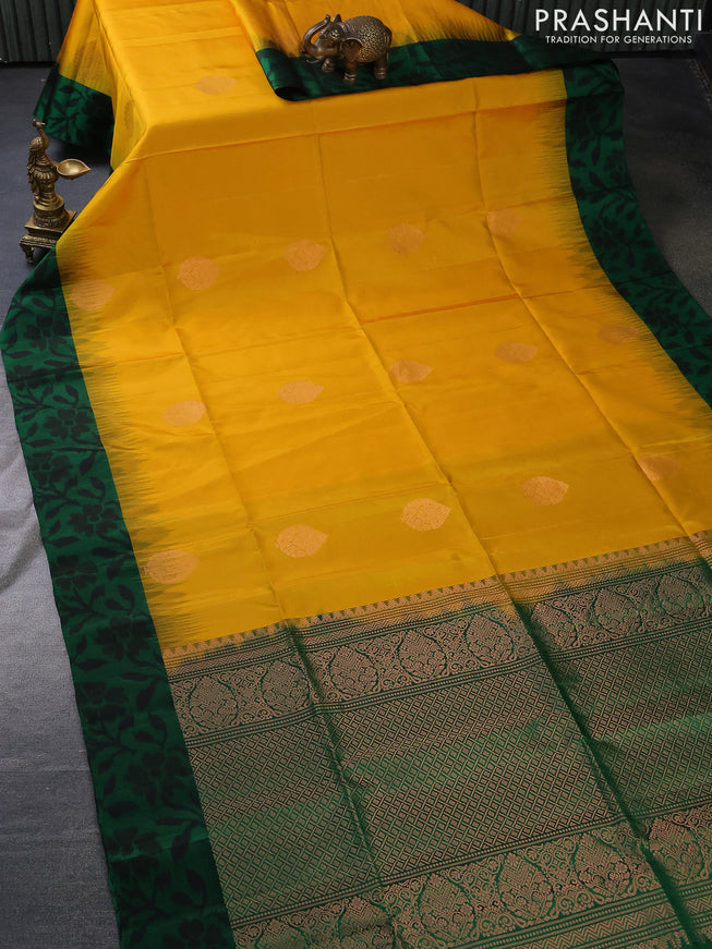 Pure soft silk saree yellow and green with copper zari woven buttas and ikat style border