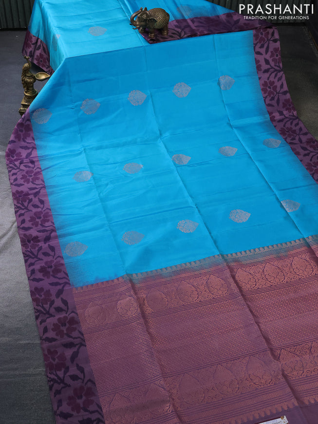 Pure soft silk saree light blue and pastel purple shade with copper zari woven buttas and ikat style border