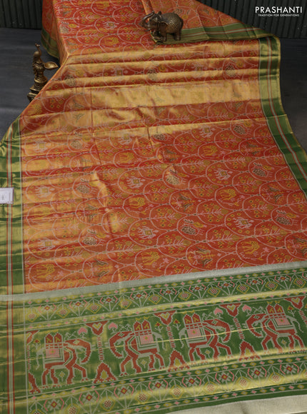 Tissue paithani silk saree dual shade of orange and mehendi green with allover patola weaves and zari woven border