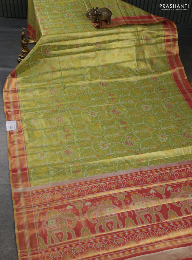 Tissue paithani silk saree dual shade of green and pink with allover patola weaves and zari woven border