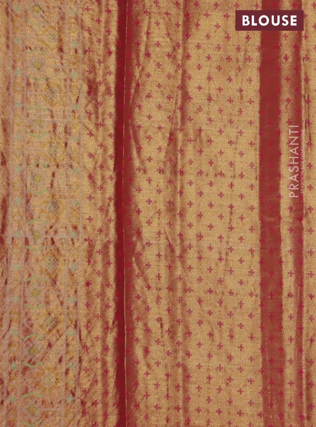 Tissue paithani silk saree dual shade of green and pink with allover patola weaves and zari woven border