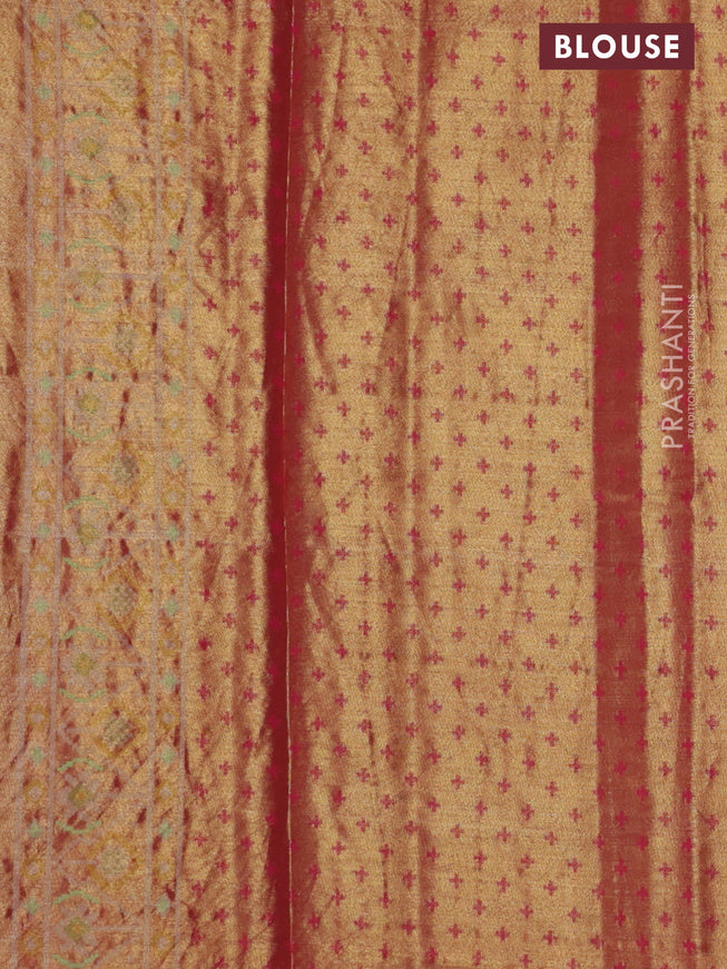 Tissue paithani silk saree dual shade of green and pink with allover patola weaves and zari woven border