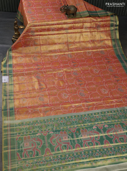 Tissue paithani silk saree dual shade of orange and teal green with allover patola weaves and zari woven border