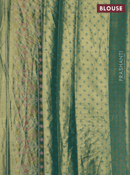 Tissue paithani silk saree dual shade of orange and teal green with allover patola weaves and zari woven border