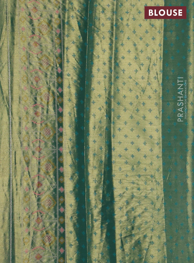 Tissue paithani silk saree dual shade of orange and teal green with allover patola weaves and zari woven border