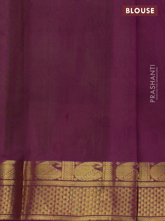 Silk cotton saree light green and purple with plain body and zari woven border