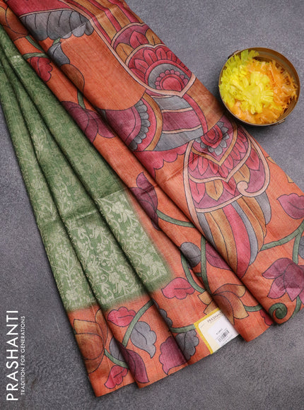 Semi jute silk saree green and orange with allover zari woven brocade weaves and kalamkari printed pallu