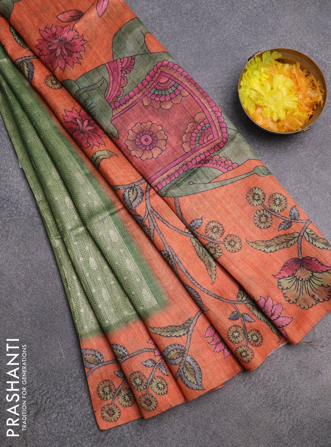 Semi jute silk saree green and orange with allover zari woven brocade weaves and kalamkari printed pallu