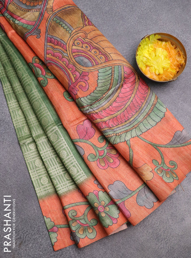 Semi jute silk saree green and orange with allover zari woven brocade weaves and kalamkari printed pallu