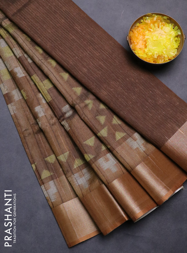 Semi matka saree brown shade and yellow with allover ikat prints and zari woven border