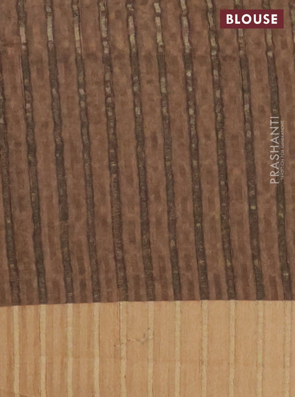 Semi matka saree brown shade and yellow with allover ikat prints and zari woven border