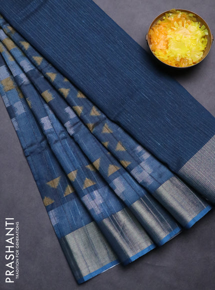 Semi matka saree dark peacock blue with allover ikat prints and zari woven border