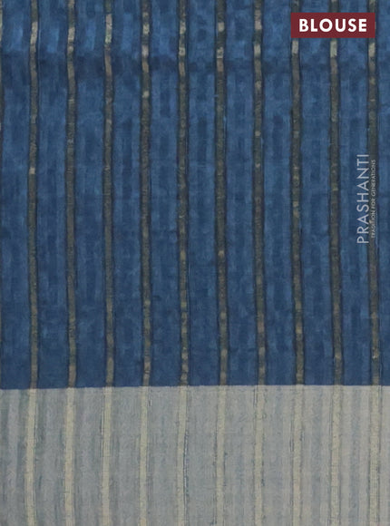 Semi matka saree dark peacock blue with allover ikat prints and zari woven border