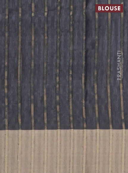 Semi matka saree black with allover ikat prints and zari woven border