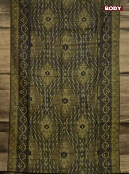 Semi matka saree mehendi green with allover ikat prints and zari woven border