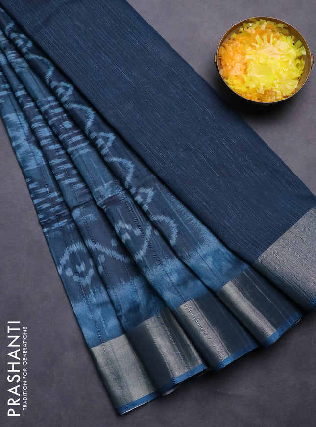 Semi matka saree peacock blue with allover ikat prints and zari woven border
