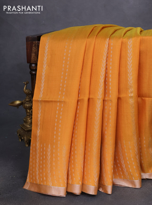 Pure raw silk saree mustard yellow and pink with allover silver zari weaves and silver zari woven border