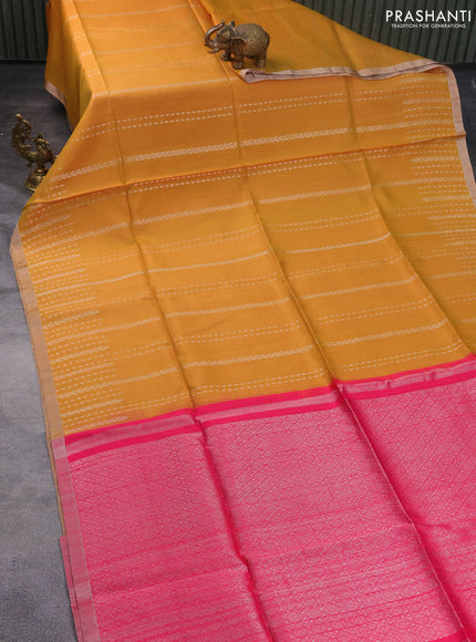 Pure raw silk saree mustard yellow and pink with allover silver zari weaves and silver zari woven border