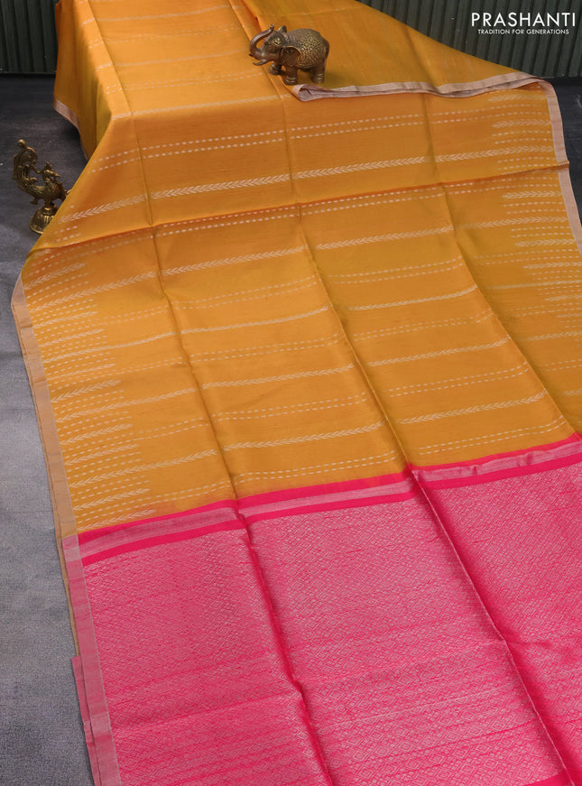 Pure raw silk saree mustard yellow and pink with allover silver zari weaves and silver zari woven border