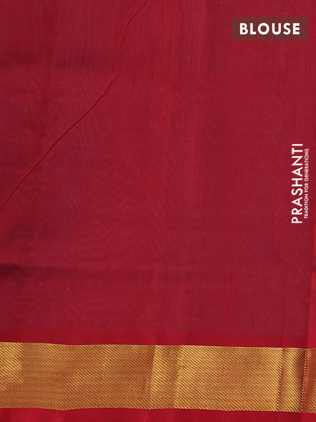 Silk cotton saree light blue and red with plain body and zari woven border