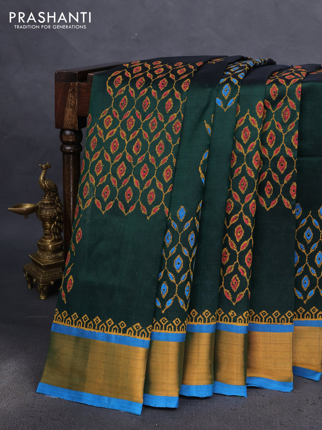 Silk cotton block printed saree bottle green and cs blue with butta prints and zari woven border