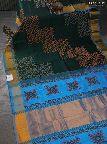 Silk cotton block printed saree bottle green and cs blue with butta prints and zari woven border